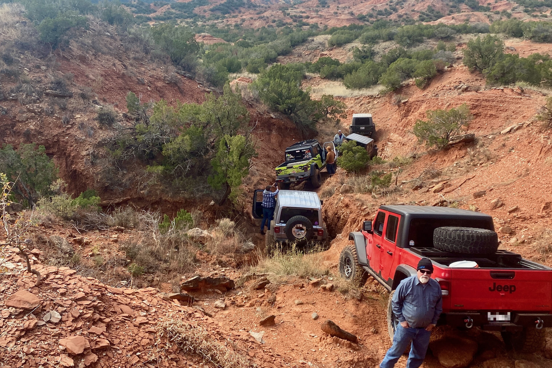 Off-road vehicles move through a rugged canyon route at MERUS Adventure Park.